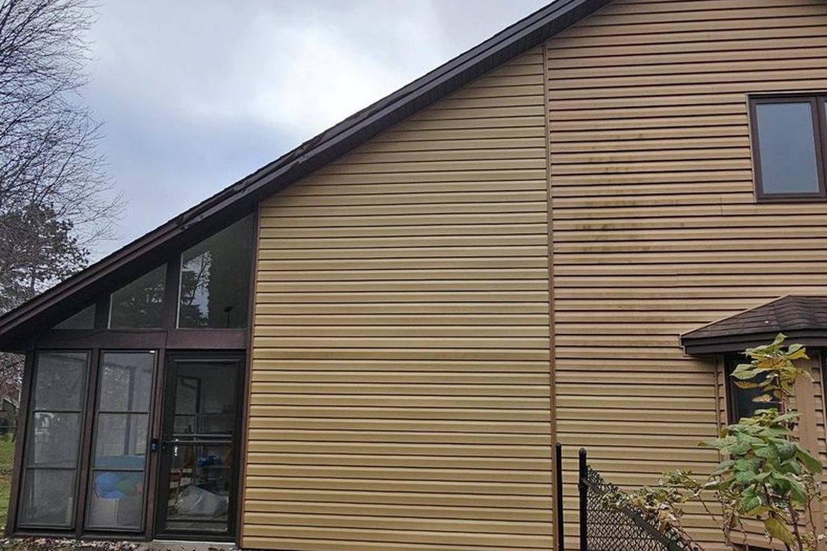 After: siding matched, chimney gone