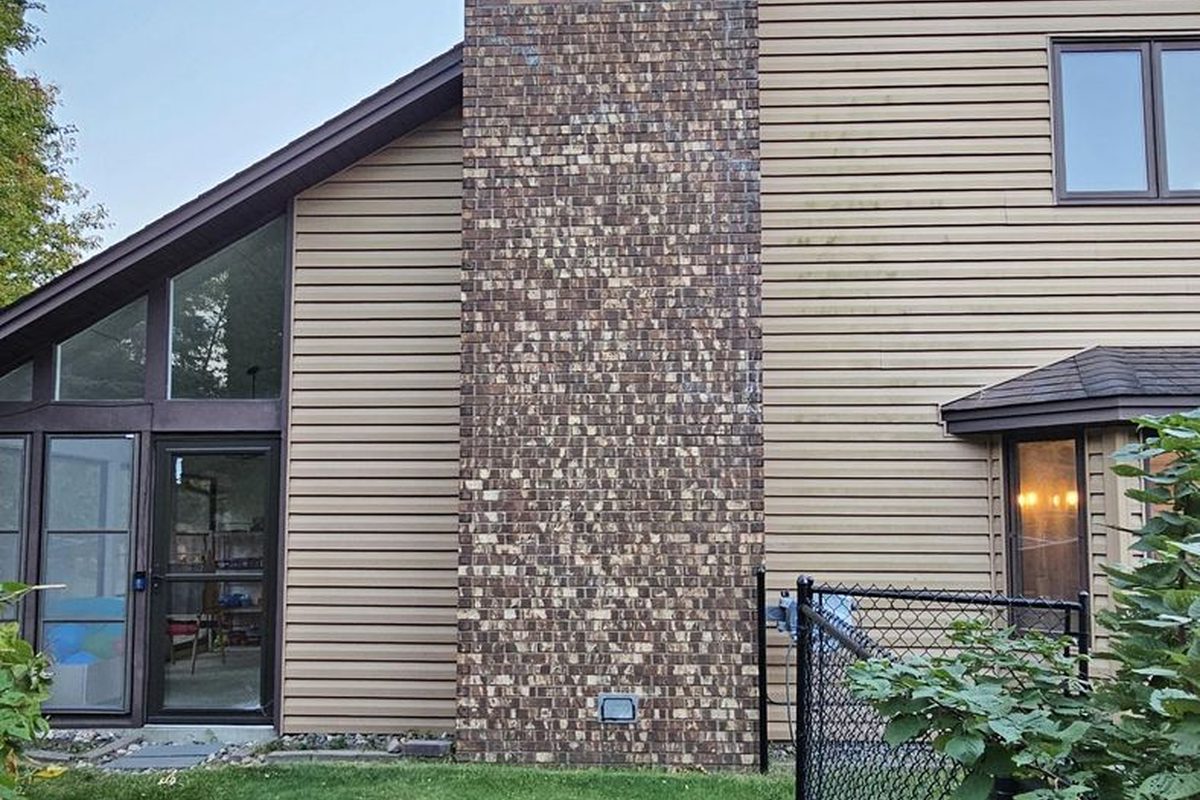 Before: two-story brick chimney