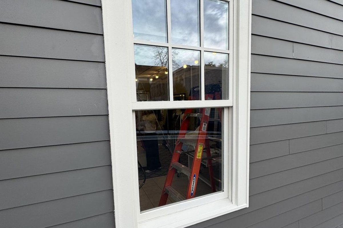 After: new window, siding painted to match