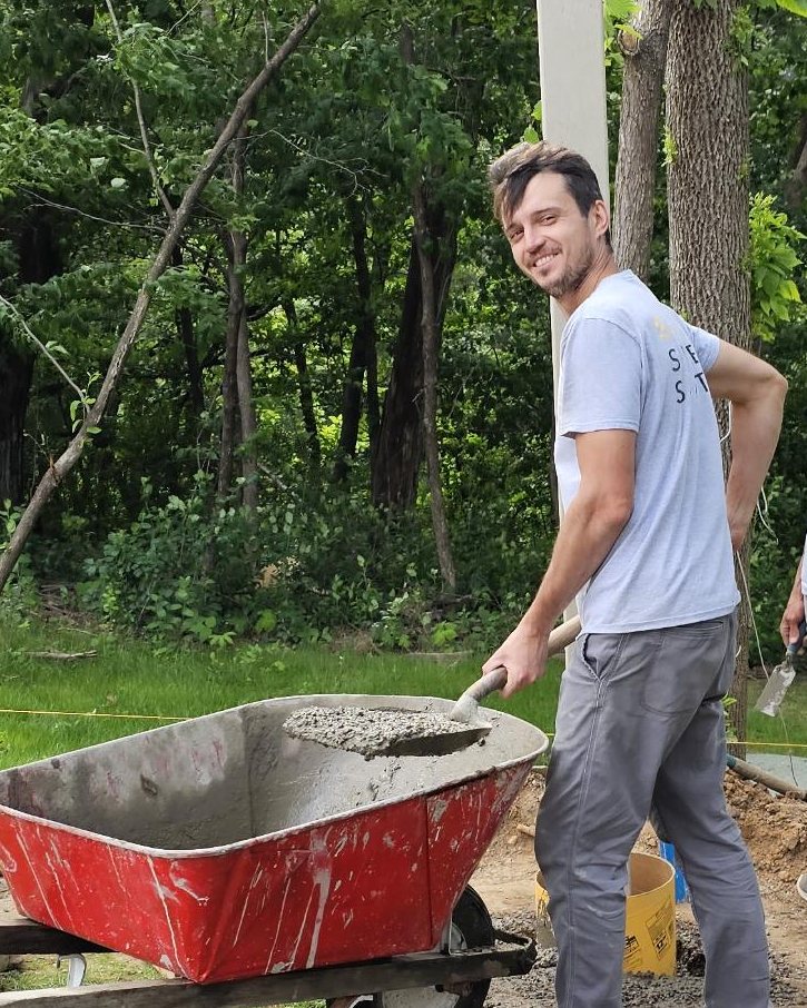 Boris Belousov, owner of Goldmark Builders, on a fence job