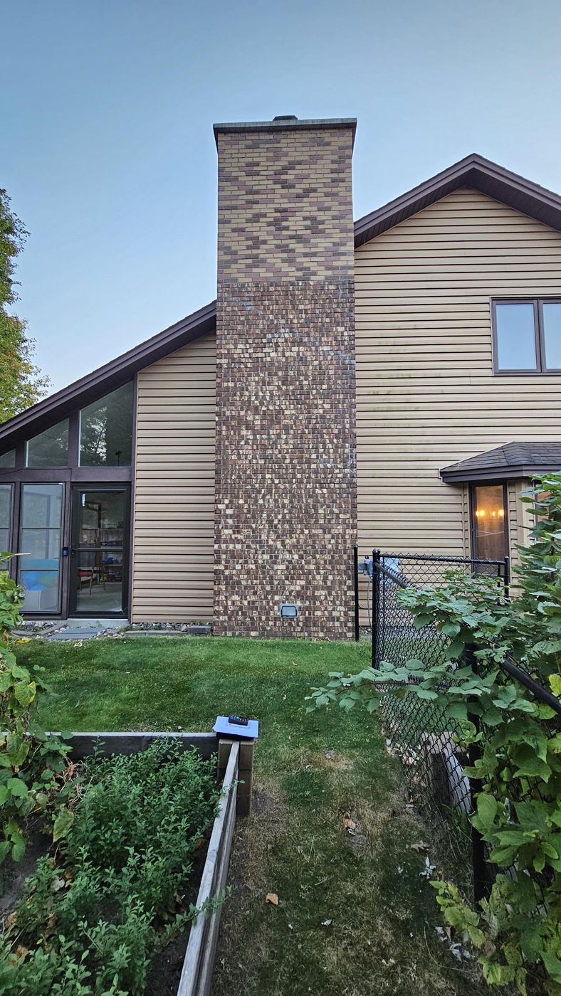 Before: two-story chimney, roof to grade