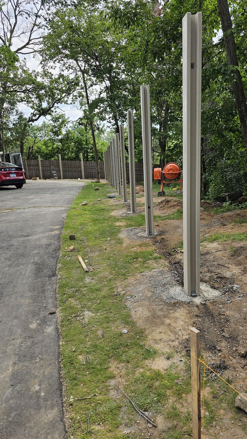 Posts set plumb and on line along the drive