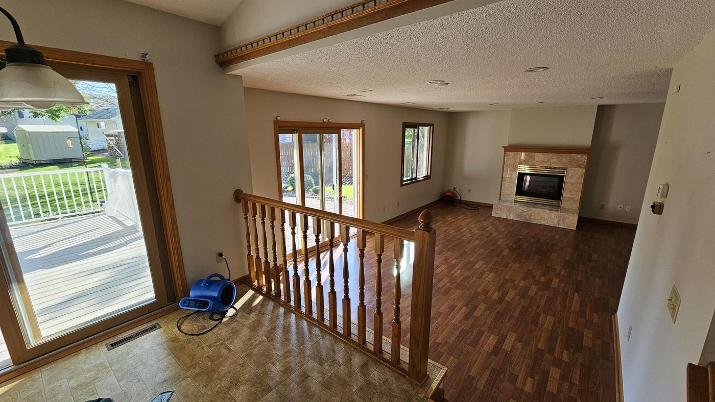 Air movers running in a water-damaged home