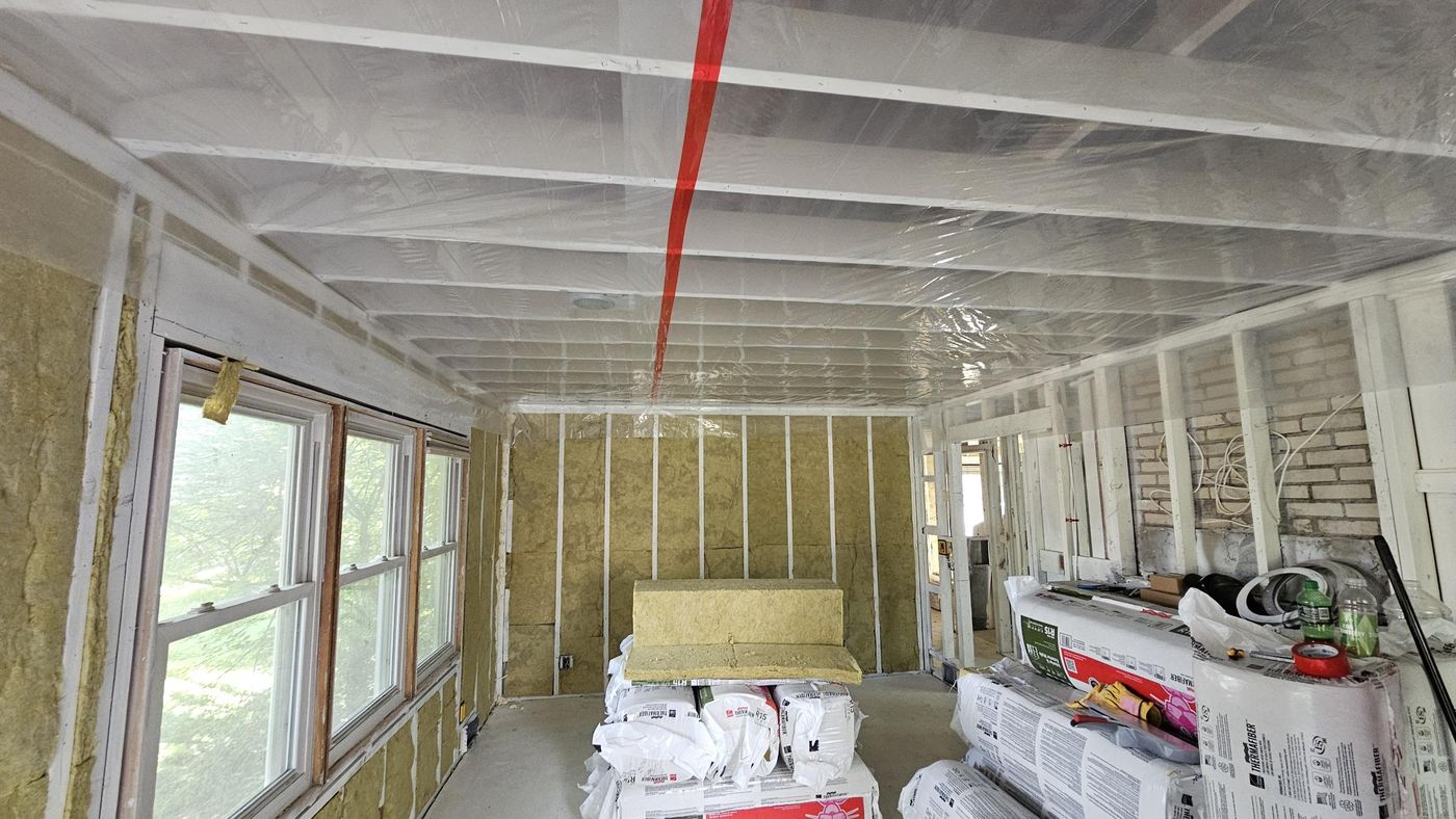 Insulation and vapor barrier before drywall