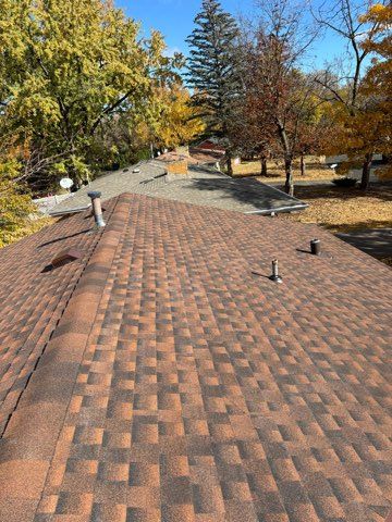 Finished roof: architectural shingles and new vents
