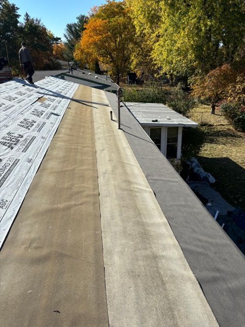 Flat section prepped with new base sheet